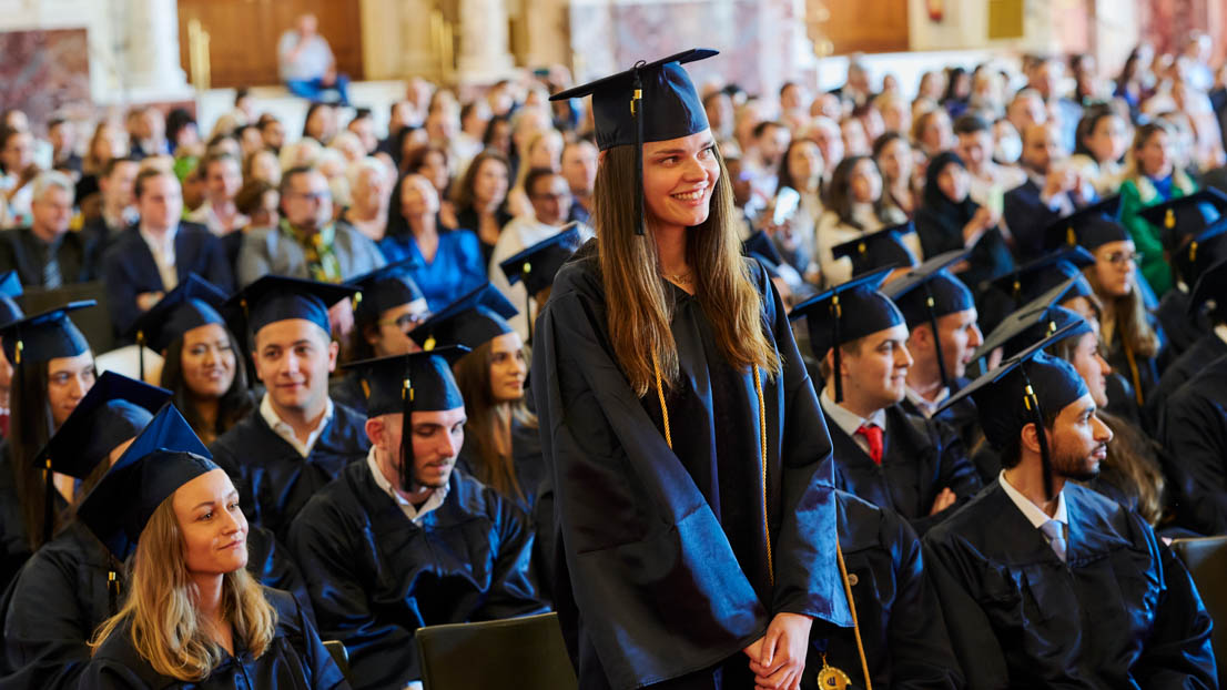 a student is recognized at the Webster University in Vienna commencement 2022